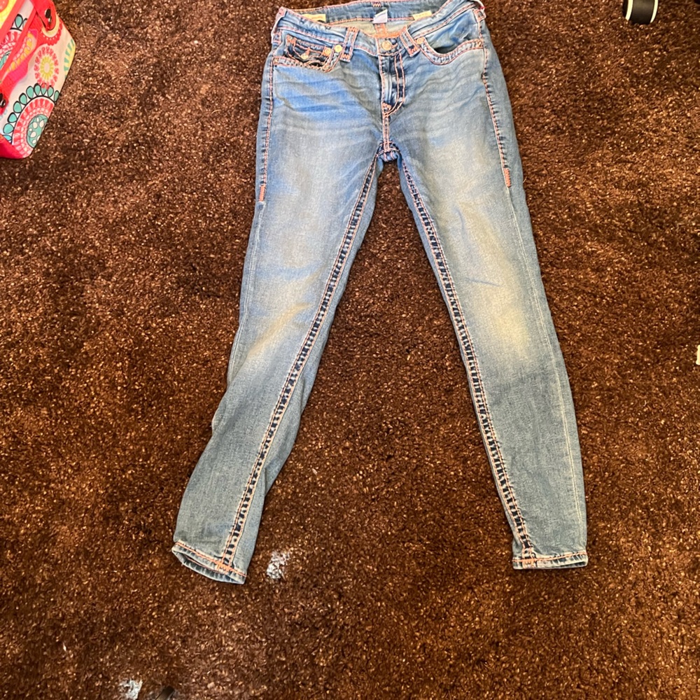 Size 27 True Religion Jeans with Barbie pink stitching! Worn twice.